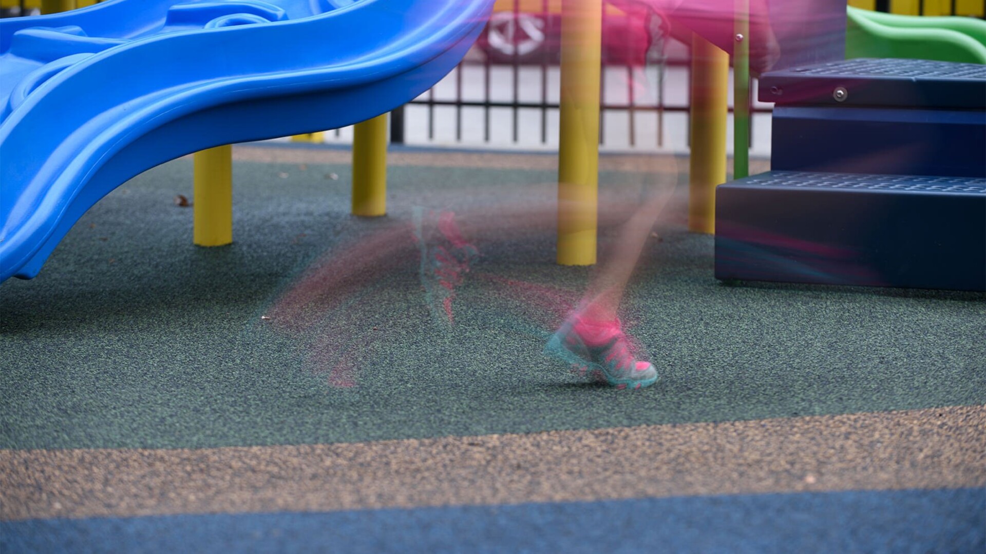 Colourful rubber playground surfacing installation